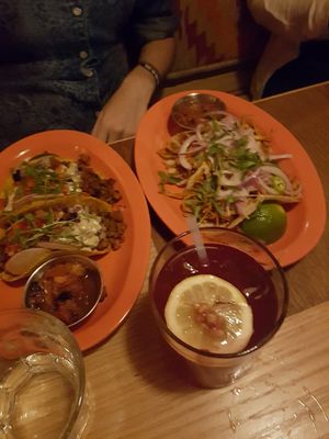 Left: Chorizo tacos; Center: Pomegranate y jalapeño cocktail; Right: Barbacoa tacos at Jajaja Mexicana - West Village in New York City