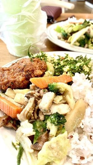 Rice with Stir fried mixed vegetables, stir fried cabbage and Vada.  Precooked vegetarian food is servers till noon at a very affordable price.  at Veggie House - บ้านเจ in Pathum Thani