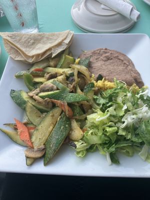 A really cute place on 9th Street in Durham with lots of personality.  Indoor and outdoor seating.  Food tasted like it had been precooked for a while and heated up; not freshh  at Blue Corn Cafe in Durham