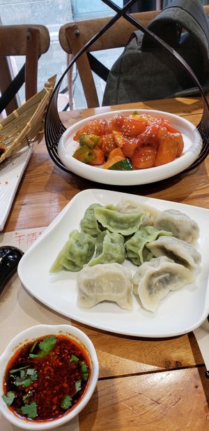 Sweet and sour winter melon (a weird choice of vegetable to prepare this way) and dumplings (only okay) at WángYǔYān Sù Fāng 王语嫣素坊 in Dali