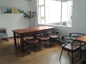 large tables at Coffee Vegetarian 宅菽咖啡蔬食馆 - Zhái Shū KāFēi in Dali