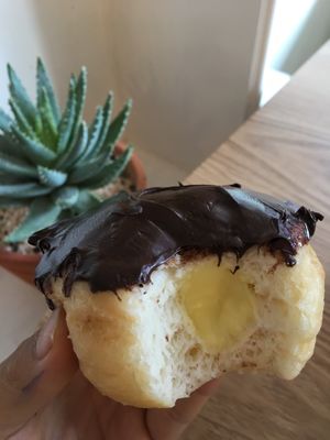 Filllled with cream! So much so that it was oozing out the bottom of the donut too at The Donut Cafe in Chiang Mai