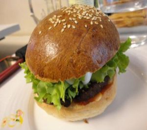 Delicious Veggie Burger with vegan cheese at Loving Hut in Paris