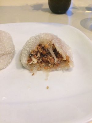 Like mochi, studded with peanuts, sesame seeds, and coconut. So delicious.  at Loving Hut in Paris