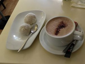 Boules de coco et un chocolat au lait de soja, très bonne association! at Loving Hut in Paris