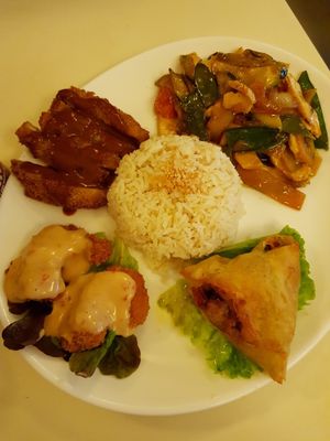 Samosa, "prawns", soy steak, tofu with veggies and rice at Loving Hut in Paris