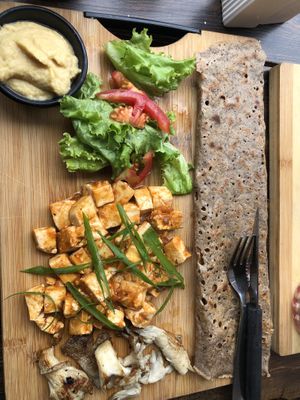 Tofu scrambled, hummus, flatbread  at Little Windows in Pokhara