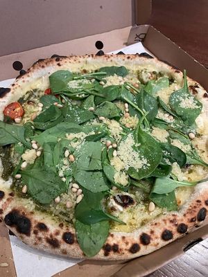 Vegan pesto pizza with spinach, pine nuts and vegan cheese. Really good!  at Pazzi in Stockholm
