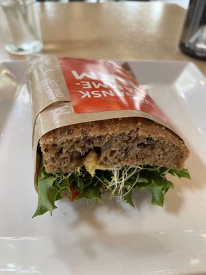 Vegan sandwich: hummus, sun dried tomato, avocado and olive  at Godt Brød in Stavanger