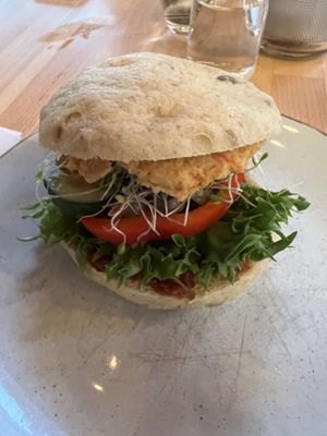 Gluten-free vegan bread roll with custom spreads and toppings. Delicious!  at Godt Brød in Stavanger