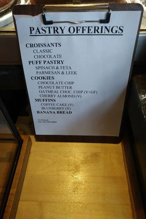 Pastry offerings menu, including savory and sweet pieces, vegan options marked as (V), glutenfree as (GF) at Dessert Oasis Coffee Roasters in Detroit