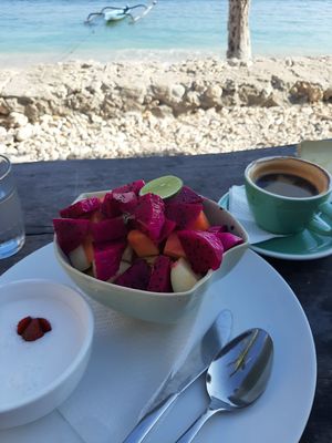 Fruit salad with coconut creme at Penida Colada Beach Bar in Penida Island