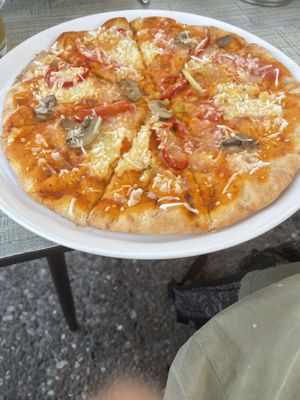Vegetable pizza with vegan cheese  at Mood in Skiathos