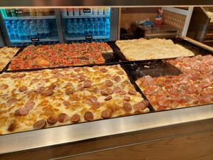 In the back: plain focaccia and mushroom pizza at Alice in Lucca