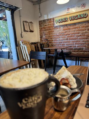 Tres leches and latte with whipped cream!   at Café Vegetal in Mexico City