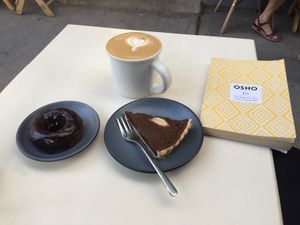 Chocolate donut and pumpkin pie with soy mylk cafe - so delicious! at Café Vegetal in Mexico City