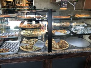 Pizza by the slice is plentiful  at 3 Brothers of Rockville Center in Rockville Centre