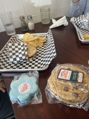 Heavily modified BBQ burger in background (to suit a child’s palate) and some goodies in the foreground!  at Cosmic Veggies in Anacortes