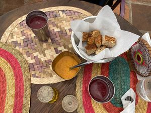Starter bread, juice, and spicy salsa  at Govinda Ram in Tepoztlan