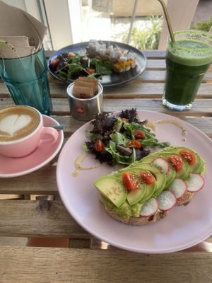 Avocado toast and sweet potato hummus with vegan feta. Superfood juice and oat flat white   at Sugar Rabbit Kaffé in Albufeira