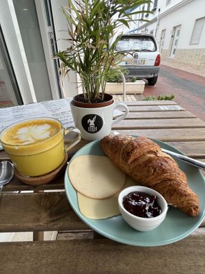 Golden mylk latte & Le croissant 🥐   at Sugar Rabbit Kaffé in Albufeira