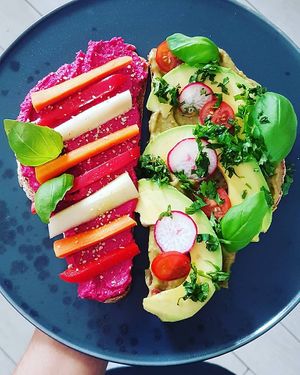 open toast mix of our bestsellers smashed avocato toast and beet hummus veggie toast at Sugar Rabbit Kaffé in Albufeira