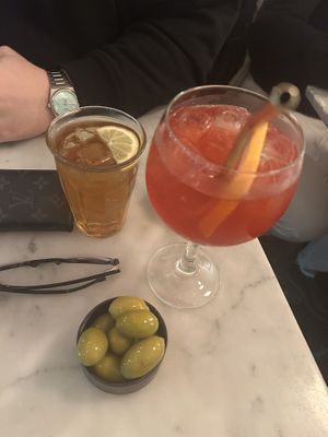 Ice tea, virgin pink spritz, fresh organic olives  at NONA Pizza in Brussels