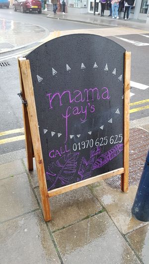 Sign board at Mama Fay's in Aberystwyth