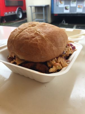This picture does not do it justice. Filled with soy curls, vegan coleslaw, and mouth-watering goodness. at Homegrown Smoker Vegan Barbecue - Food Cart in Portland