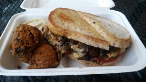 Mushroom melt special with side of hush puppies. omfg. at Homegrown Smoker Vegan Barbecue - Food Cart in Portland