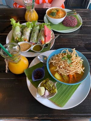 Pineapple curry and rice, khao soi, spring rolls and mango smoothies!   at Mr Green in Chiang Mai