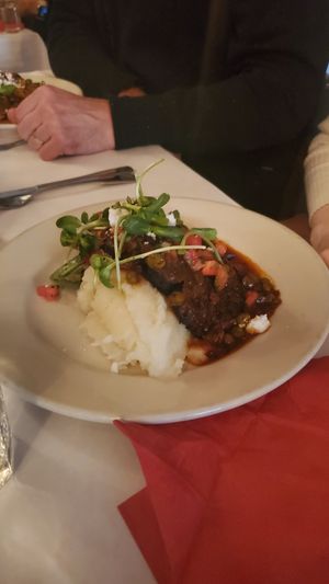 Chef's Special Plate - Organic mash potatoes Portobello with special Bolivian sauce, organic greens at Peña Pachamama in San Francisco