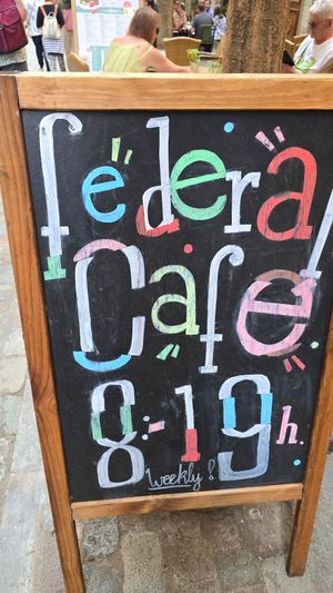 Street sign at Federal Cafe in Girona
