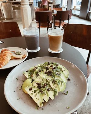 Vegan avocado cashew creme toast + oat milk latte  at Federal Cafe in Barcelona