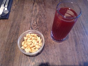Beetroot juice and peanuts at Green House  in Brussels