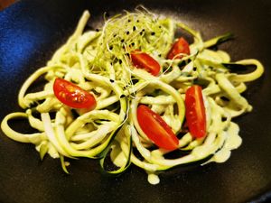 Zucchini Tagliatella with pesto. at Green House  in Brussels