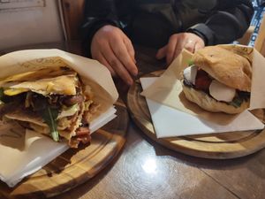 The sandwich on the left is the Tator (vegan) the sandwich on the right is the Roset (vegetarian) at A'Marenna in Sorrento