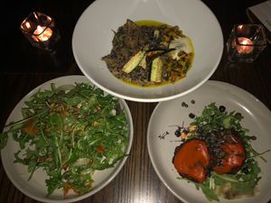 Arugula salad, heart of palm cakes, massaman curry at Plonk in Bozeman