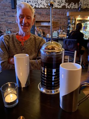 Hot pressed coffee to end our perfect meal (Shared: arugula salad, olive platter, crab cakes, and cheesecake - all vegan- all excellent.) at Plonk in Bozeman