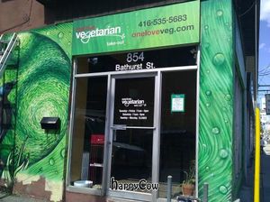 signage at One Love Vegetarian in Toronto