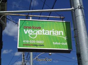 signage at One Love Vegetarian in Toronto