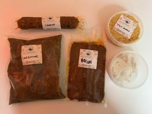 what I bought (the white unlabelled one is vegan goat cheese)  at The Vegan Butcher's Choice in Brussels