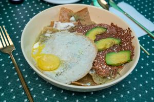 Chilaquiles con huevo estrellado todo plant based   at Rincón Veggie in Mexico City