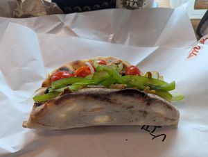 Vegan Italian sandwich - served hot on fresh flatbread at Monte's Fine Foods in Portland