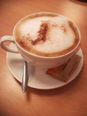 Cappuccino at Napfényes Restaurant & Confectionery in Budapest