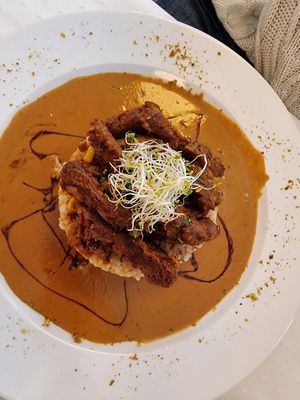 Sushi risotto with peanutbutter sauce and soy strips at Napfényes Restaurant & Confectionery in Budapest