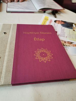 The menu in Hungarian and English at Napfényes Restaurant & Confectionery in Budapest