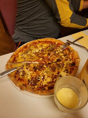 Coal burner pizza at Napfényes Restaurant & Confectionery in Budapest