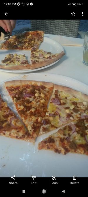 Pizza at Napfényes Restaurant & Confectionery in Budapest