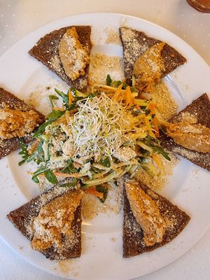 Raw pizza at Napfényes Restaurant & Confectionery in Budapest